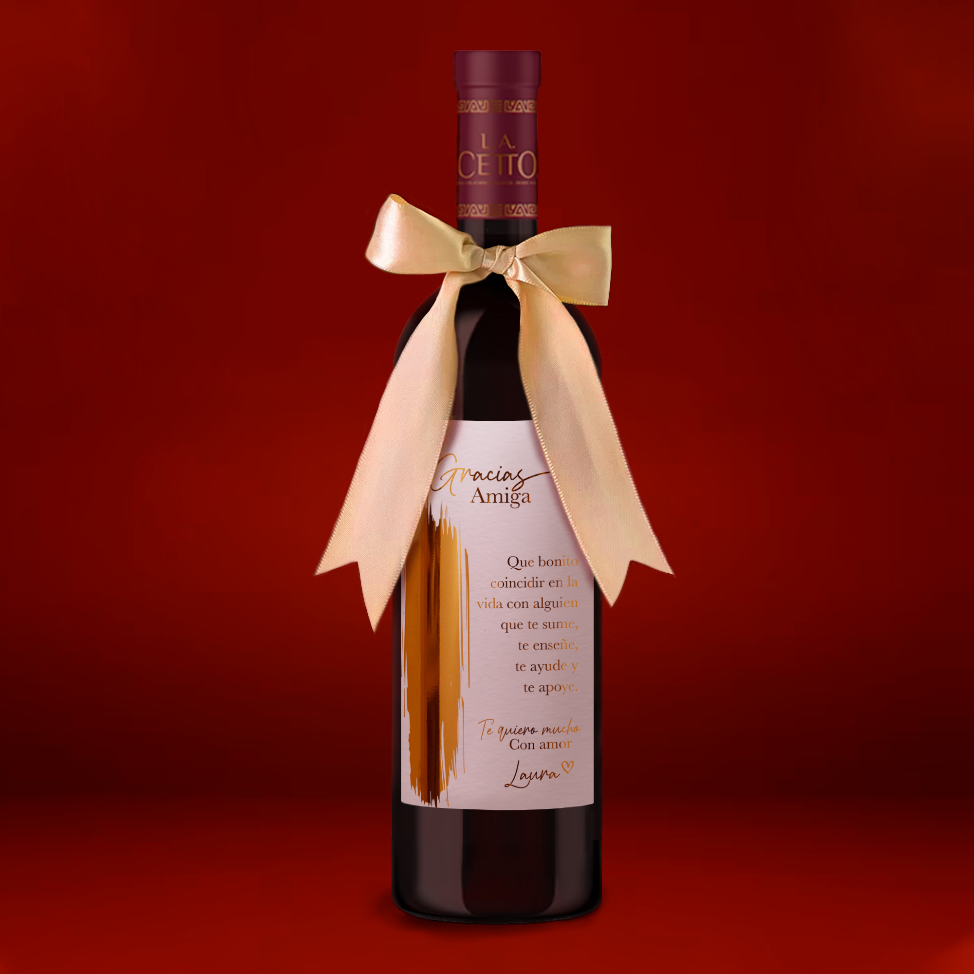 Botella de vino personalizada con etiqueta en foil dorado con mensaje de agradecimiento y moño de satín
